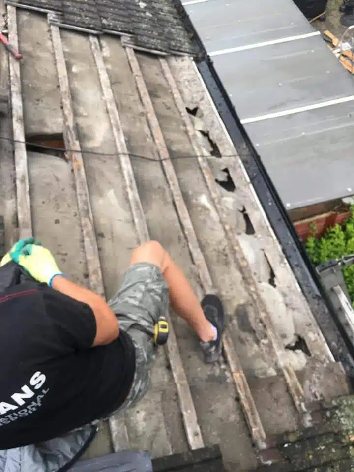 roofer fixing roof