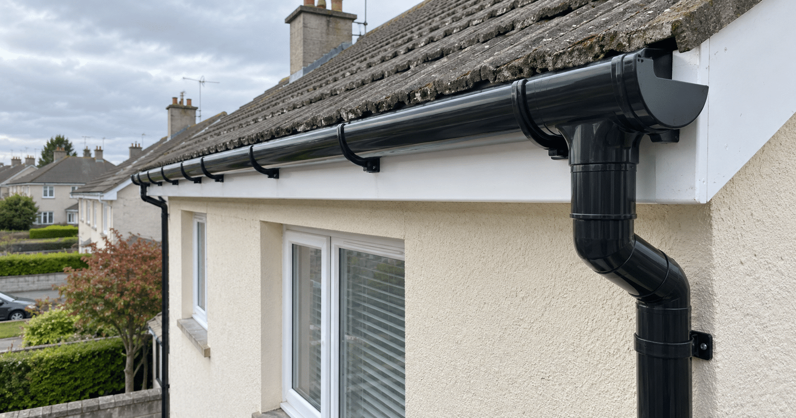 New black guttering and matching downpipe fitted to a Dublin home